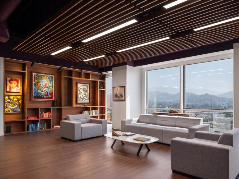 Modern Office Lobby. Large glass walls with city view. Open ceiling with wood slats.